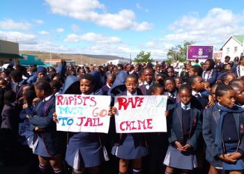 School children march for better policing after taxi driver allegedly rapes girl